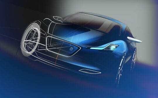 Modelo de carro feito a partir de software catia v5. Carro azul com pedaços mostrando linhas criadas dentro do software.